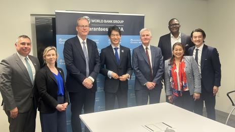 Group photo of representatives from the World Bank Group’s Multilateral Investment Guarantee Agency (MIGA) and UK Export Finance (UKEF) following the signing of a memorandum of understanding in Washington, DC, to expand cooperation on mobilizing investment and supporting projects in developing countries.