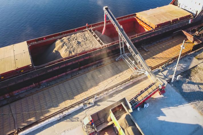 Grain being loaded onto a ship at a Ukrainian port